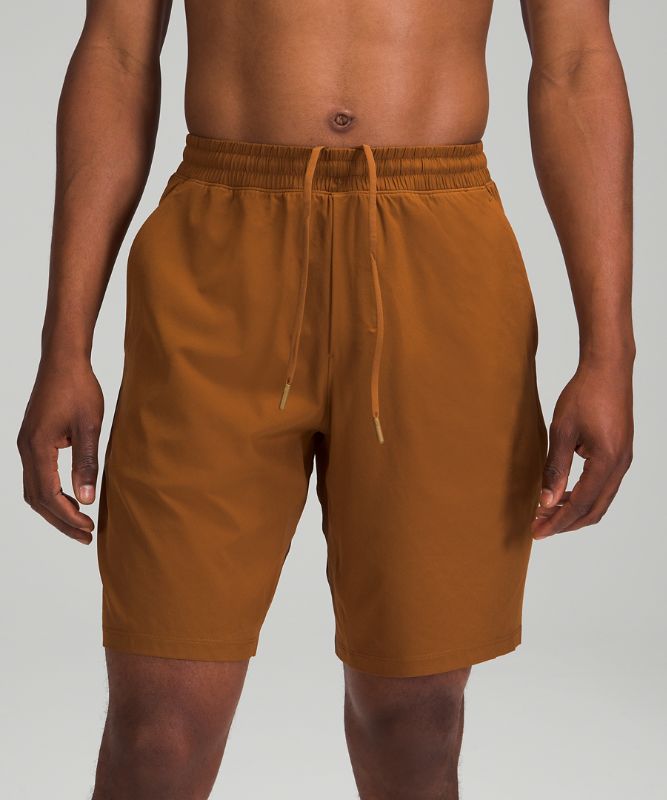 Lululemon Pace Breaker Linerless Shorts 7 In Copper Brown