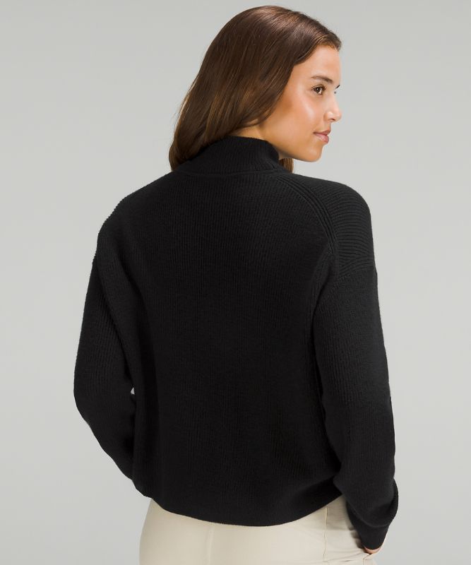 Merino Wool-Blend Ribbed Turtleneck Sweater