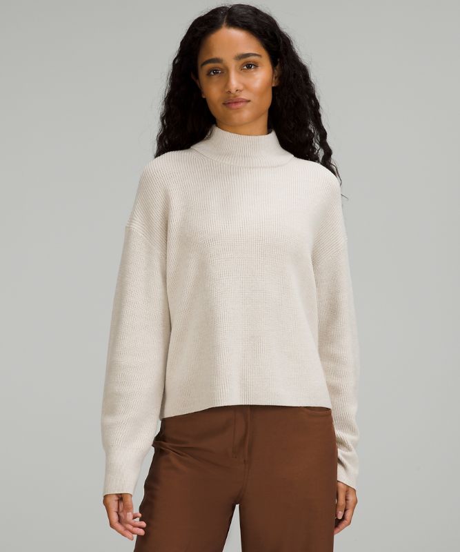 Merino Wool-Blend Ribbed Turtleneck Sweater