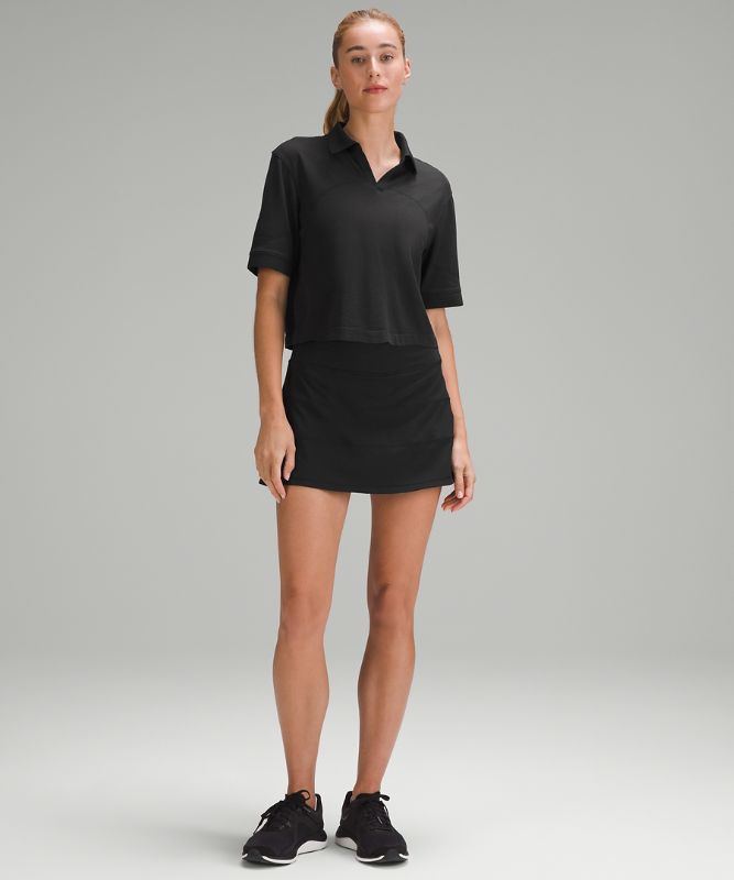 Swiftly Tech Relaxed-Fit Polo Shirt