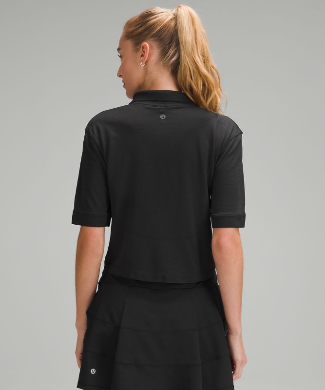 Swiftly Tech Relaxed-Fit Polo Shirt