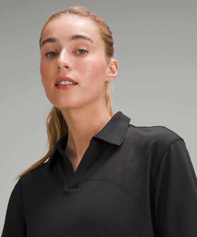 Swiftly Tech Relaxed-Fit Polo Shirt