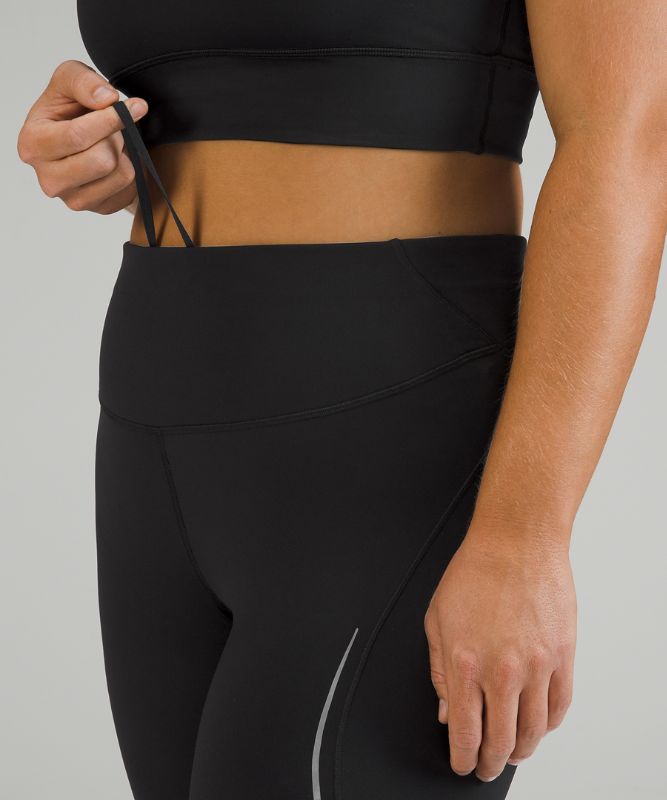 Base Pace High-Rise Reflective Crop 23"